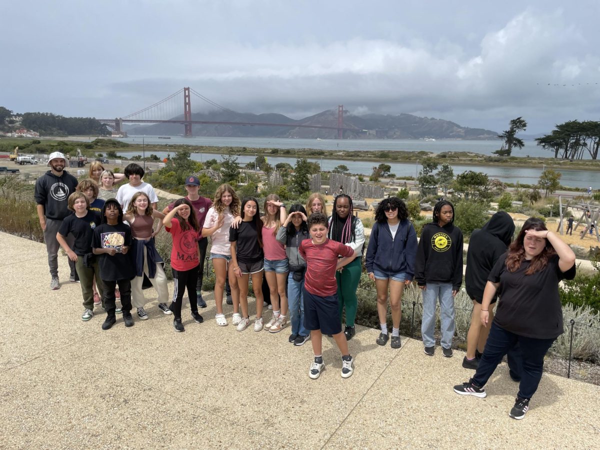 Journalism students enjoy a camping trip in the Presidio.