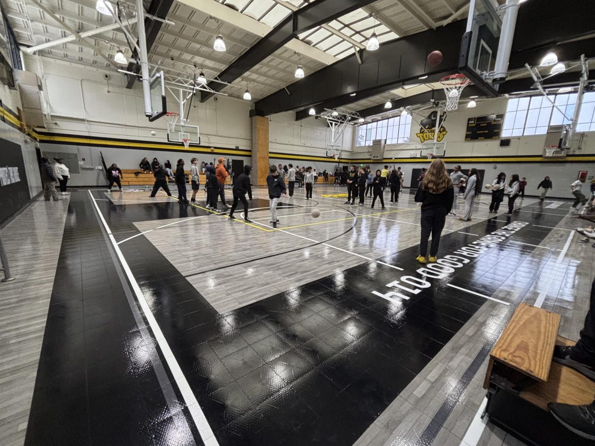 What are students' and teachers' opinions on the new gym?